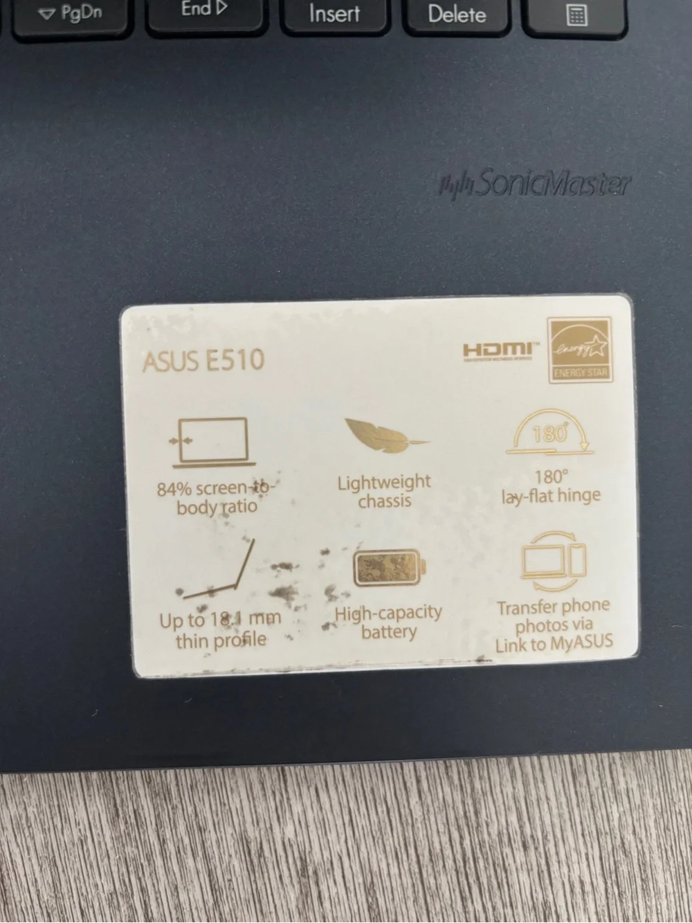 ASUS Matte Black Laptop with Highlighted Enter Key
